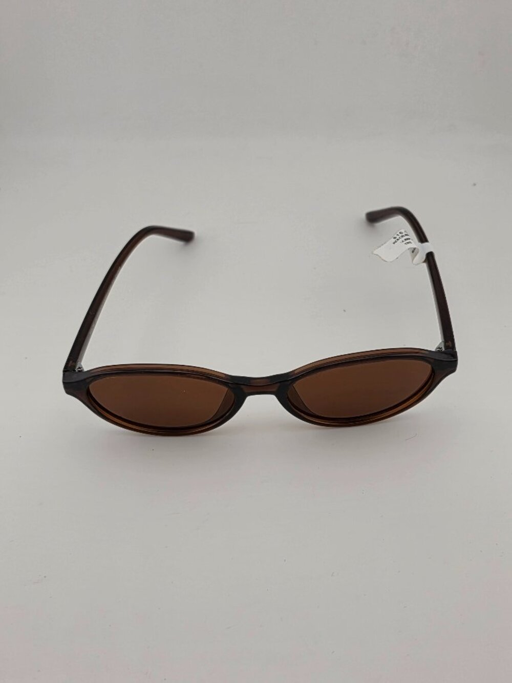 Women's oval brown sunglasses